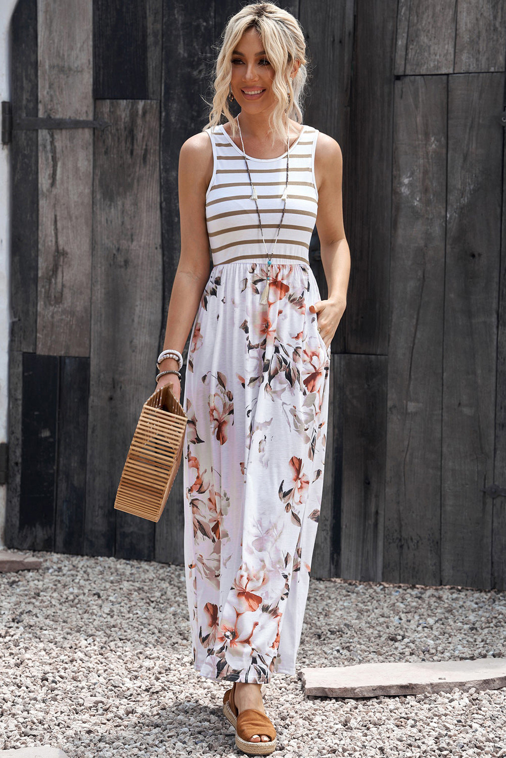 Sleeveless round-neck maxi dress in white with striped bodice and large floral print