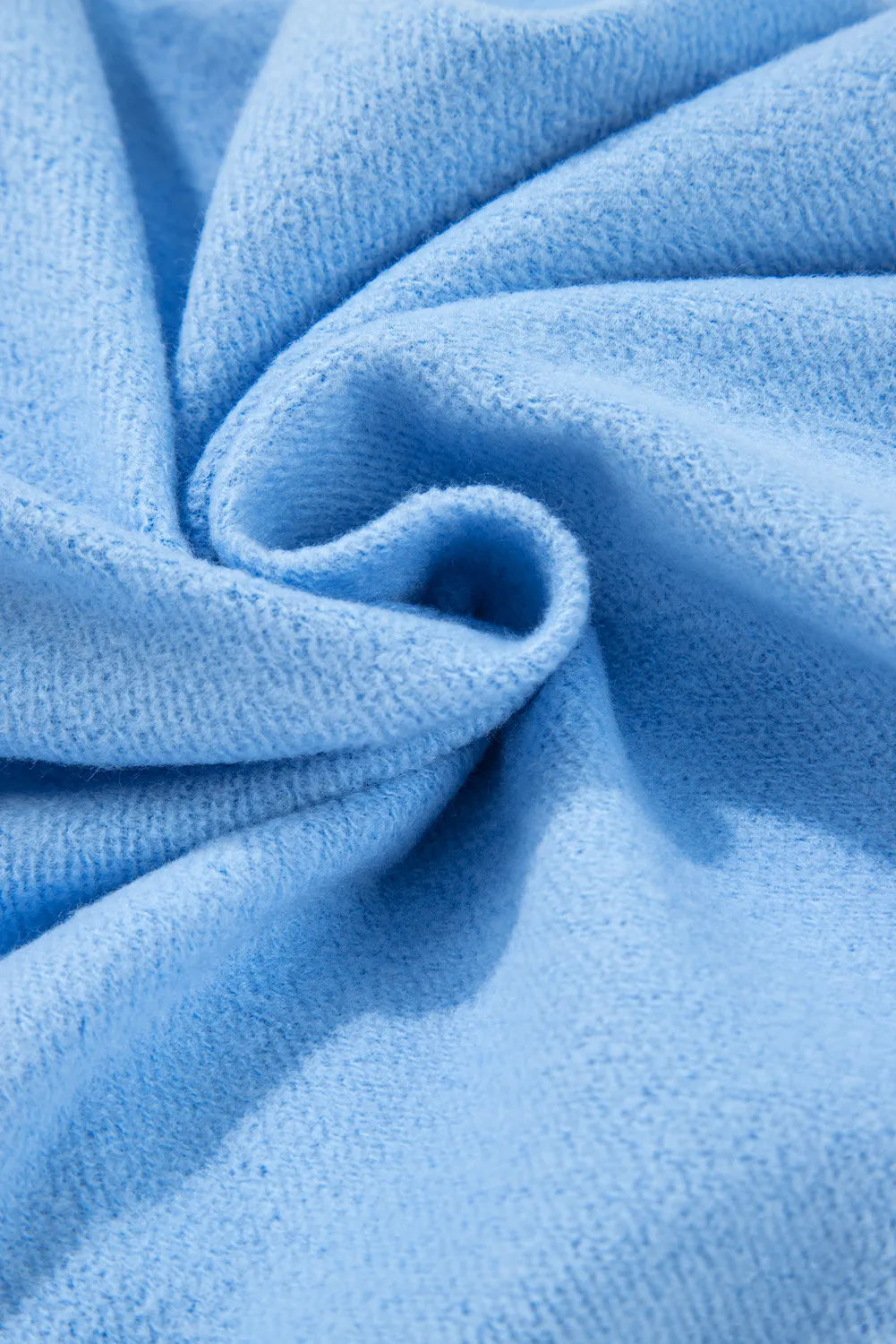 Light blue knit fabric with soft textured surface