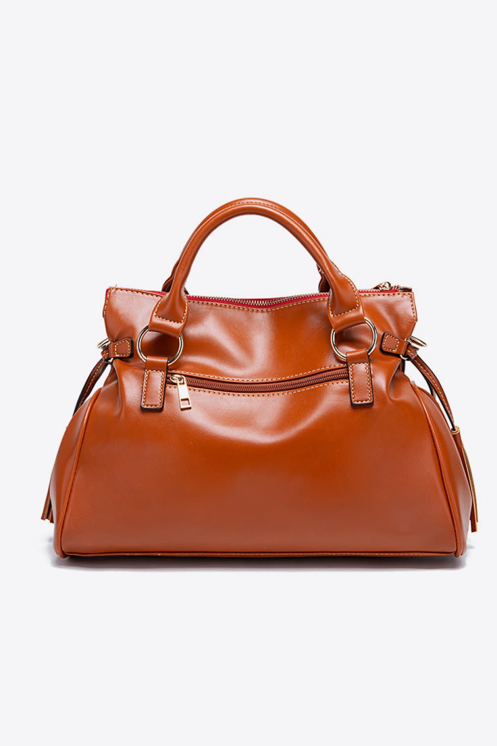 PU leather handbag in brown with tassel sides, top handles, and zippered front pocket.