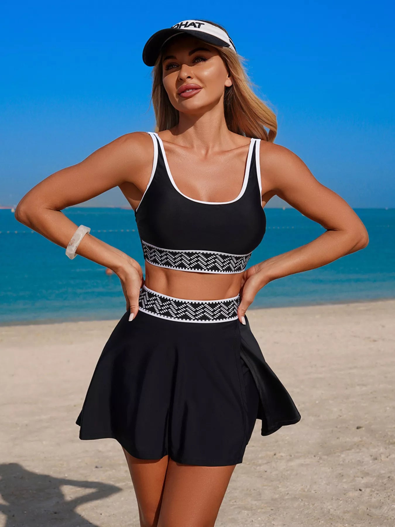 Contrast Trim Tank and Skort Swim Set in black with white piping and a patterned waistband