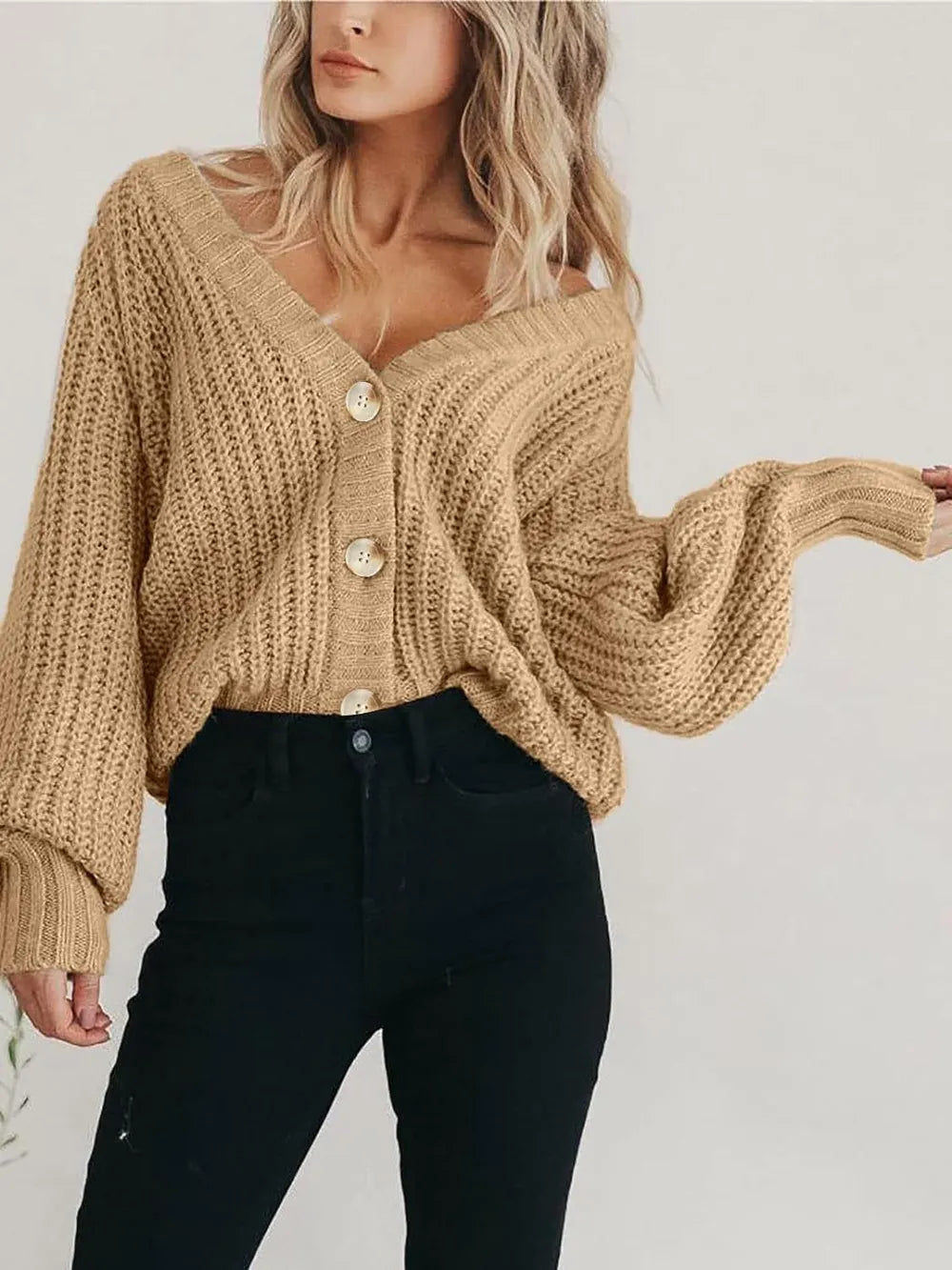 Light tan button-up long-sleeve cardigan with V-neck and ribbed cuffs