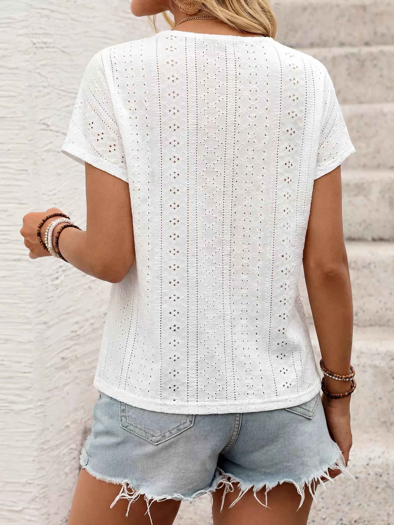 Cedar & Moore Eyelet V-Neck Short Sleeve Top in white with vertical eyelet stripes