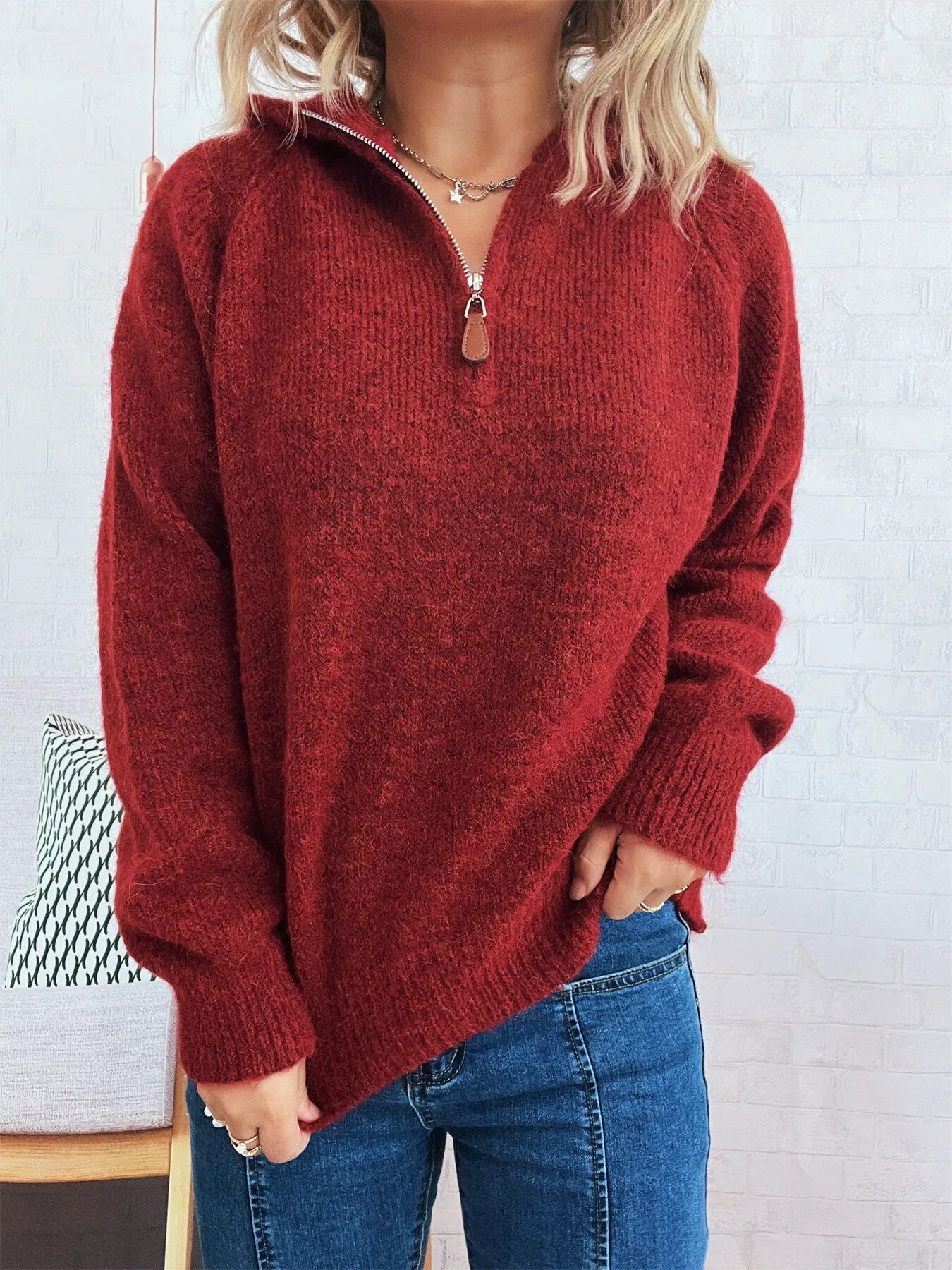 Burgundy quarter-zip knit sweater with ribbed cuffs and hem