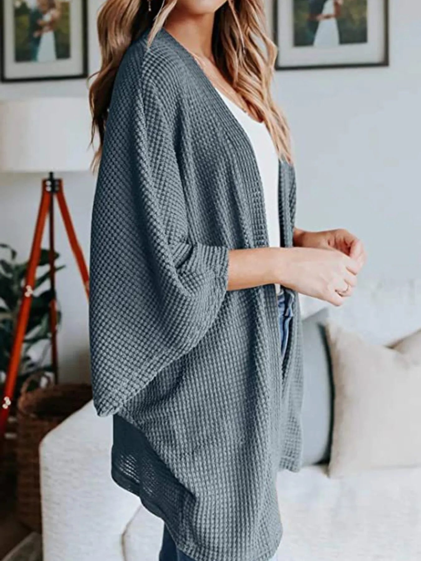 Dark blue waffle knit open-front cardigan with draped plus-size fit and wide sleeves