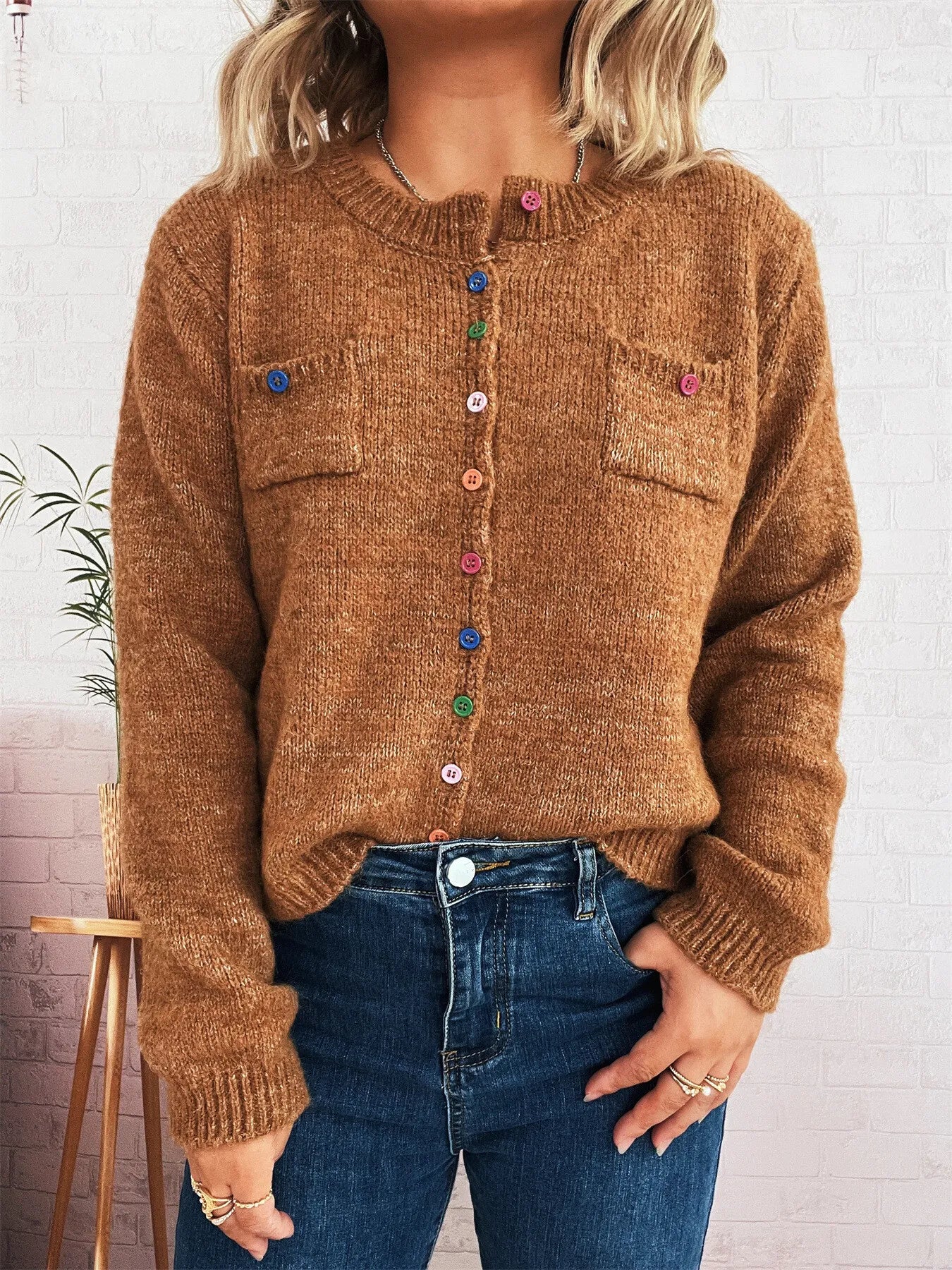 Brown button-up ribbed hem cardigan with chest pockets and colorful button placket