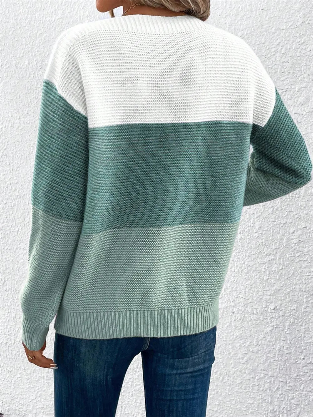 Color-block long sleeve sweater, white upper back with teal-green mid and lower sections