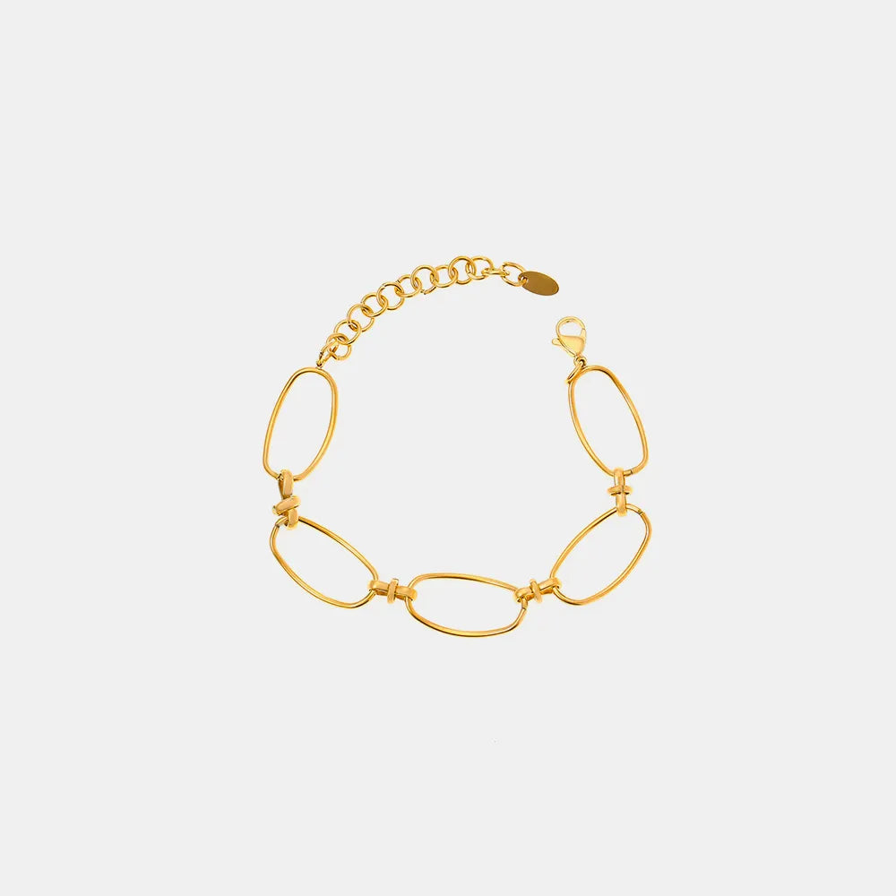 Gold chain bracelet with oval links and small round clasp ends
