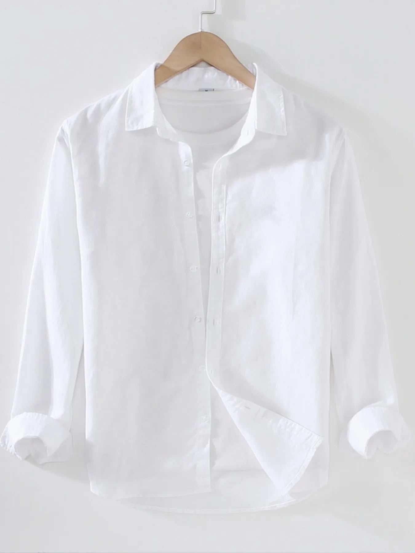 White short-sleeve button-up shirt with point collar and front button placket