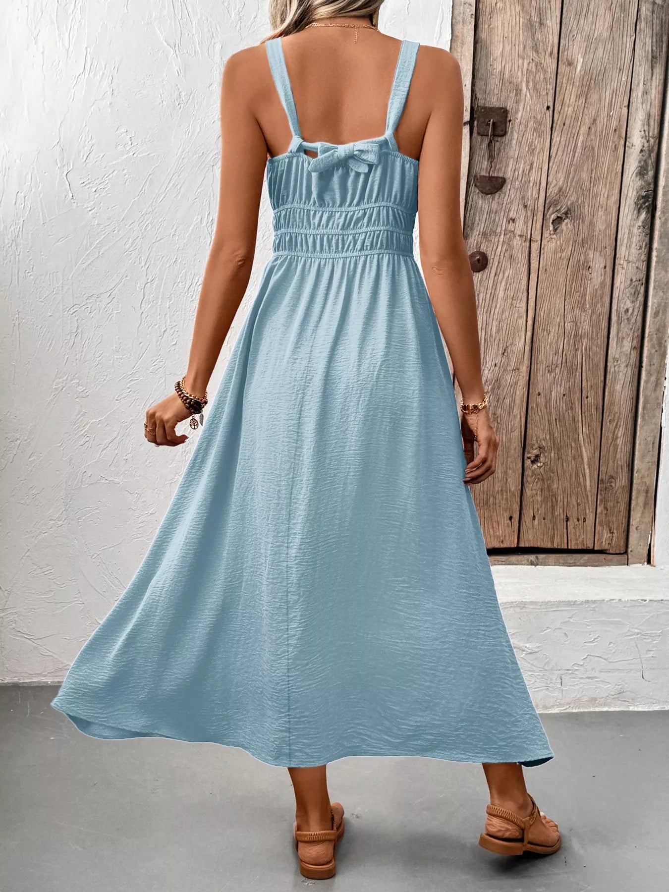 Cedar & Moore Sleeveless Smocked Casual Midi Dress in light blue with back bow detail