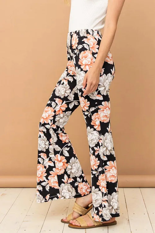 Floral wide-leg flare pants, black with orange and white flower print