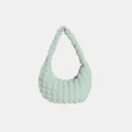 Light green textured small hobo handbag with braided shoulder strap