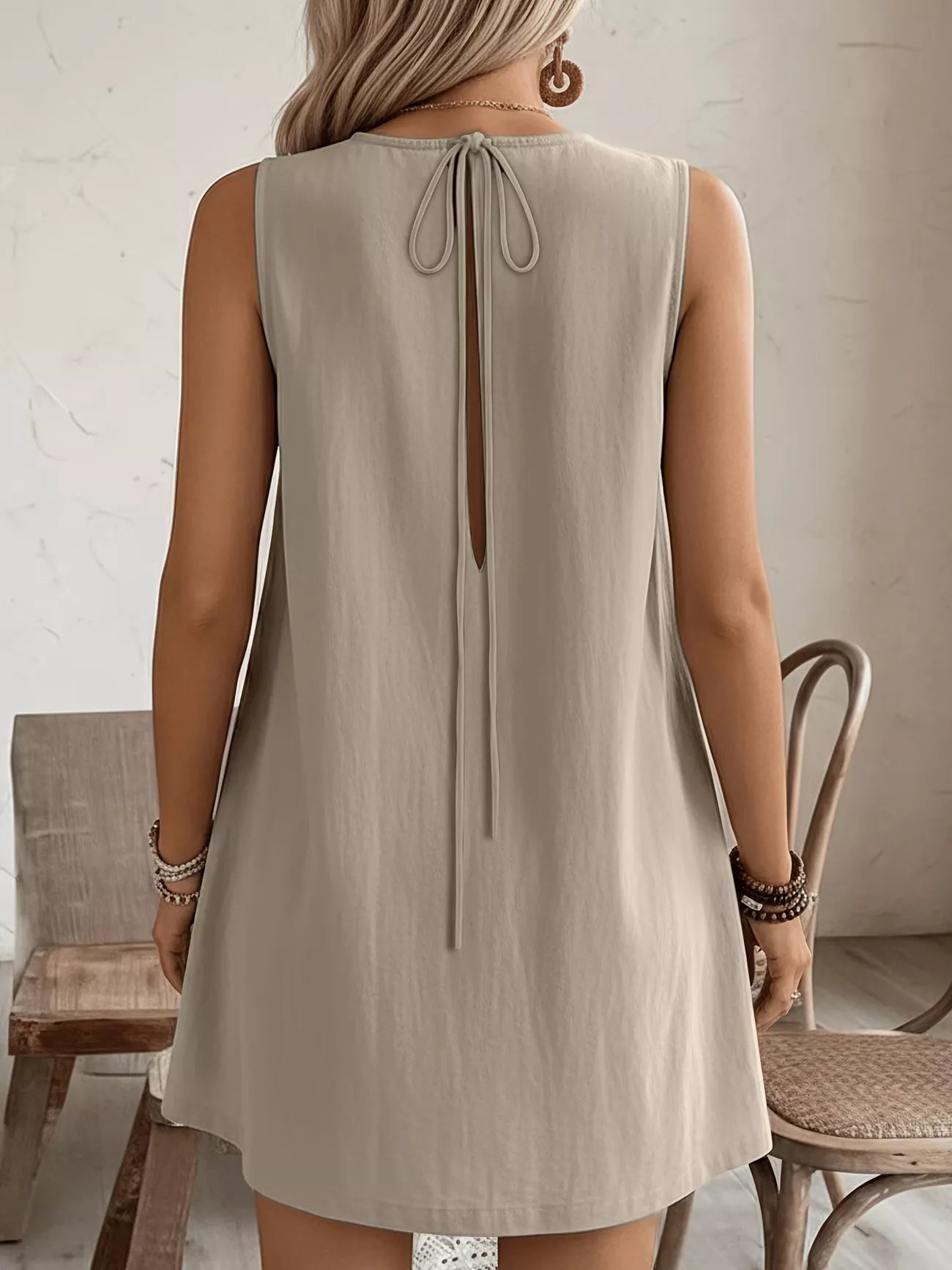 Cedar & Moore Frill Sleeveless Round Neck Dress in taupe with back tie detail, A-line