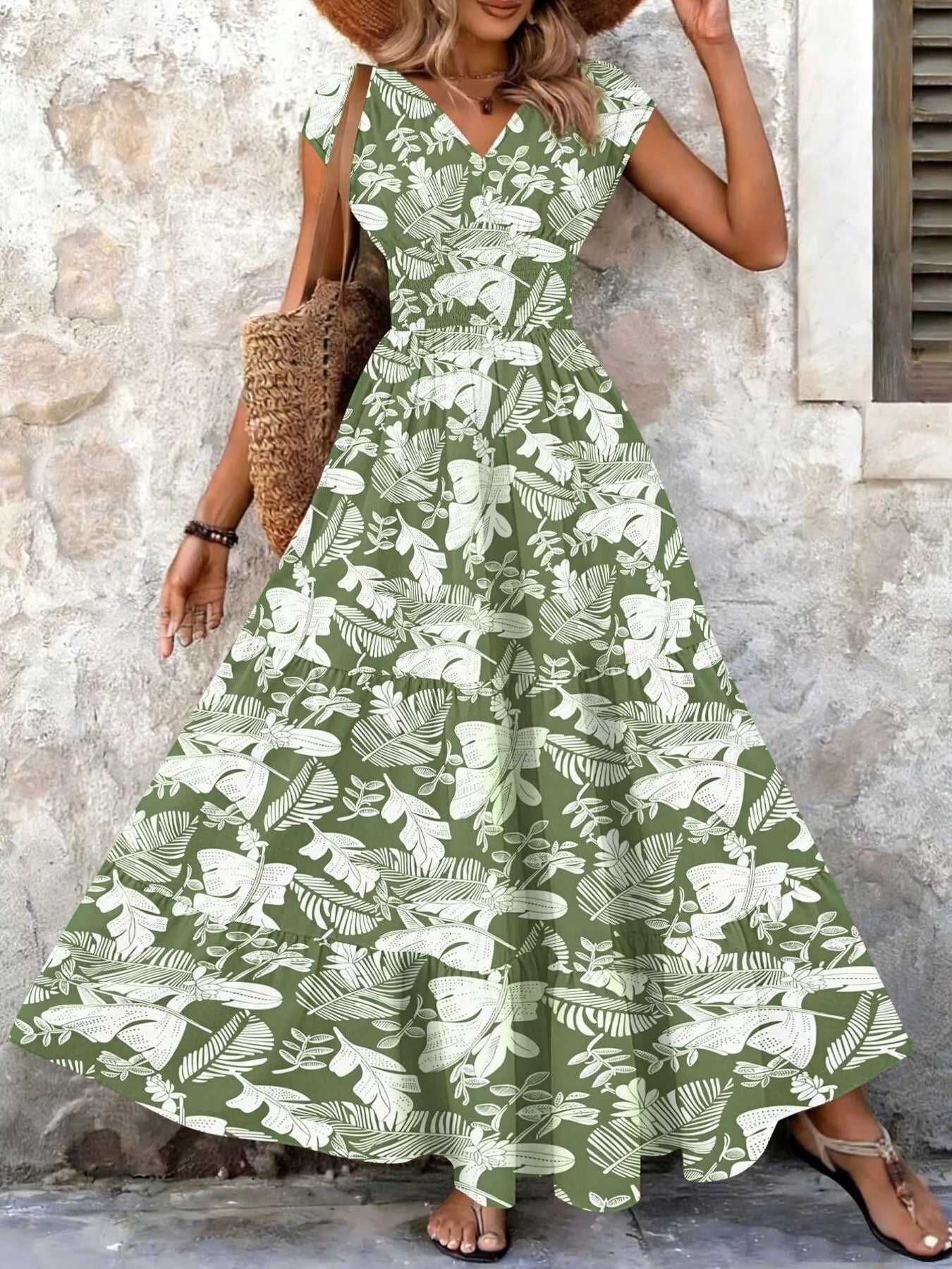 Green and white leaf printed tiered maxi dress with V-neck bodice