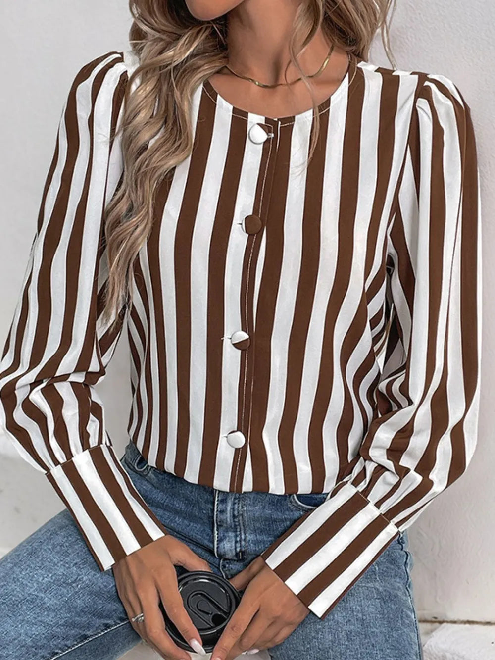 Brown and white striped long-sleeve round-neck blouse with button front placket
