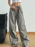 Sage wide-leg drawstring pants with elastic waistband and side pockets