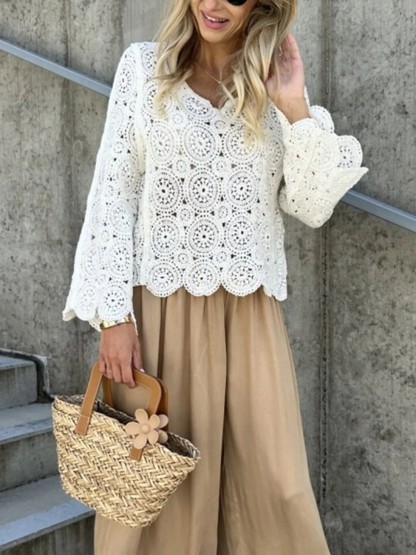 White V-neck crochet lace knit top with long bell sleeves and scalloped edges