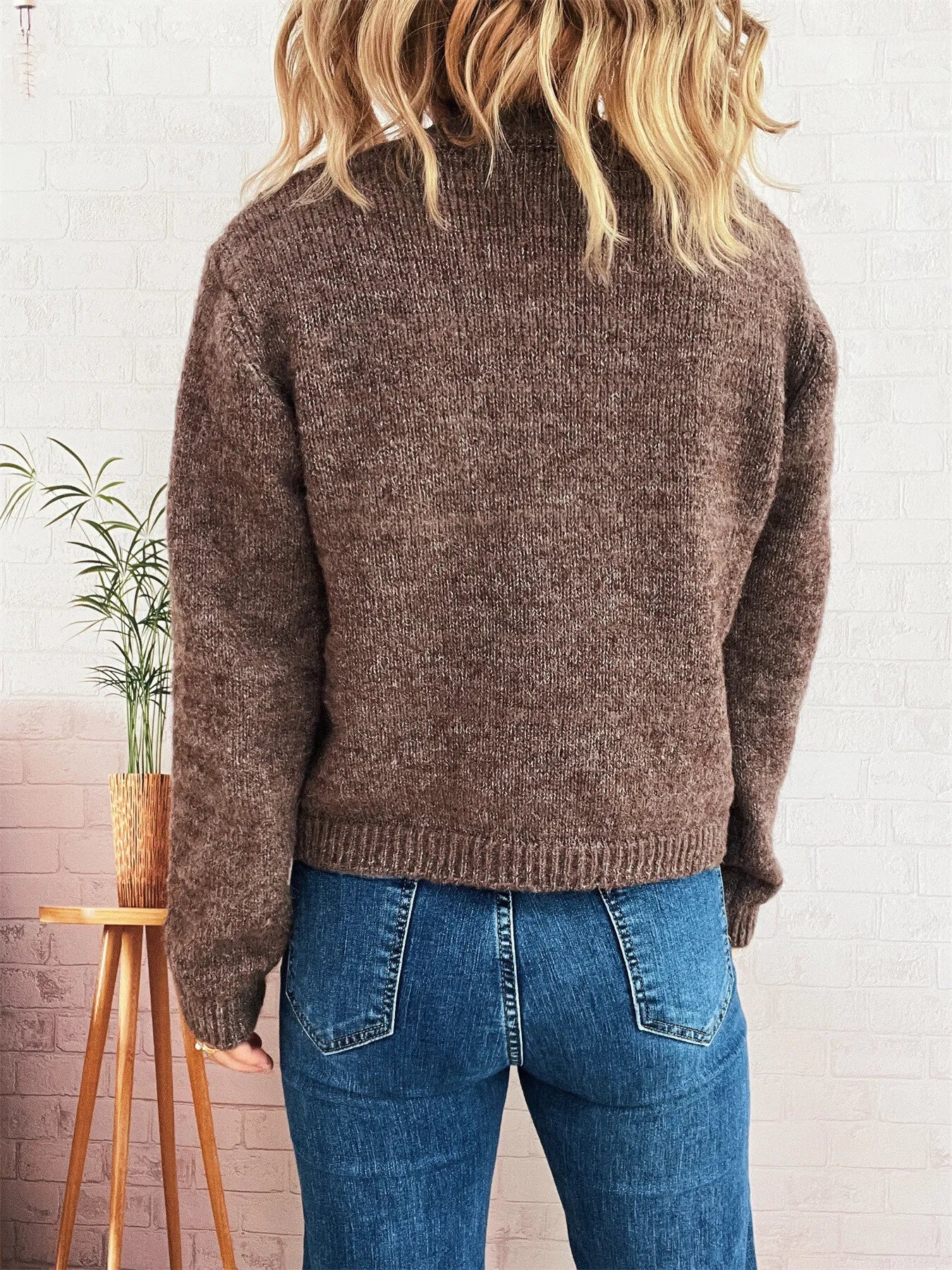 Brown ribbed hem cardigan, back view with knit texture and long sleeves