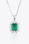 Emerald pendant necklace in 925 sterling silver with green gemstone and diamond halo