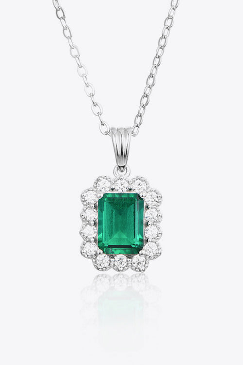 Emerald pendant necklace in 925 sterling silver with green gemstone and diamond halo