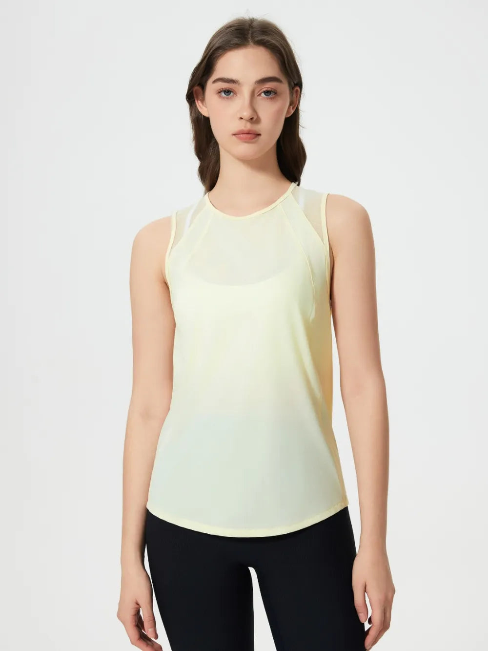 Pale yellow active tank top with round neck and sleeveless design