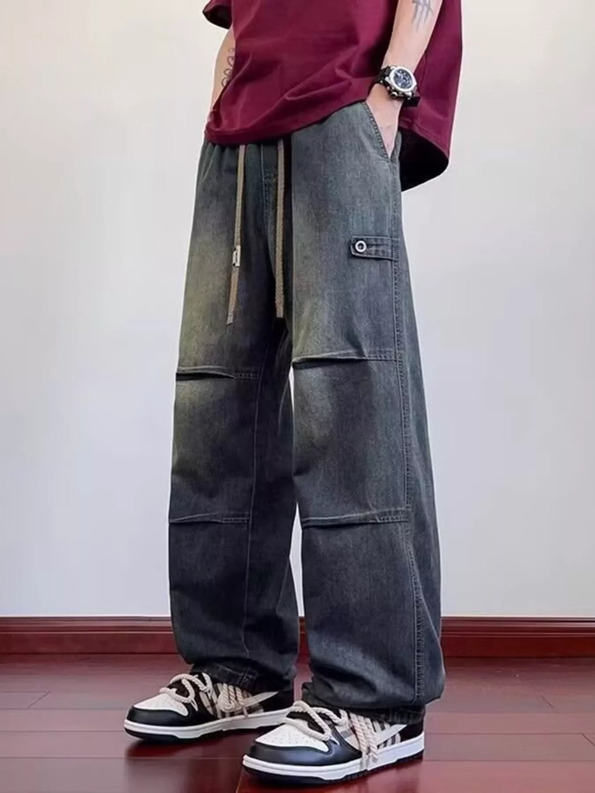 Men's wide-leg washed denim pants with patch pockets and drawstring tie, straight wide leg