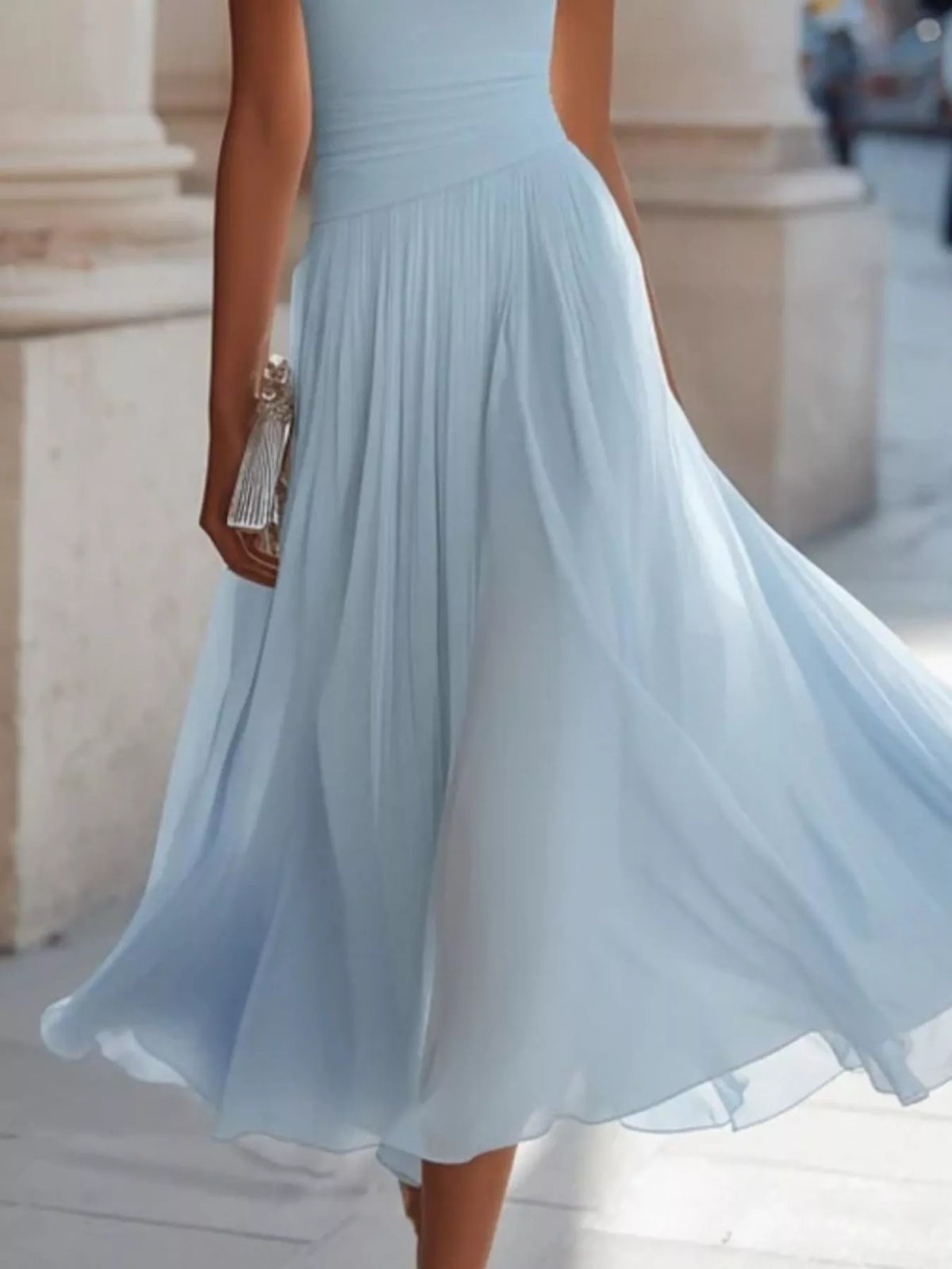 Light blue sleeveless cowl neck midi dress with pleated skirt and flowing hem