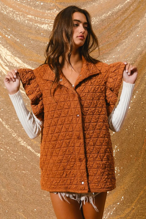 Rust quilted knit vest with open collar and ruffle sleeves, button front