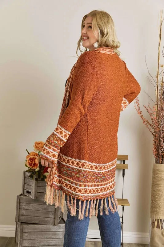 Rust cardigan back view with aztec border stripe and fringe hem, open front