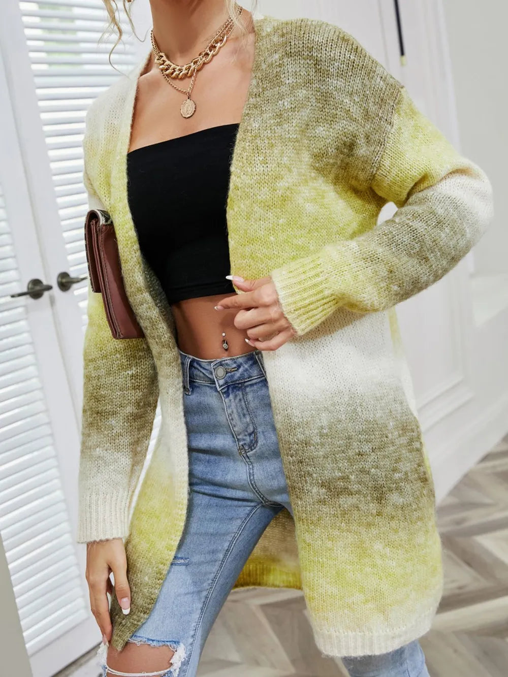 Open-front gradient cardigan sleeve and hem detail, green and white tones