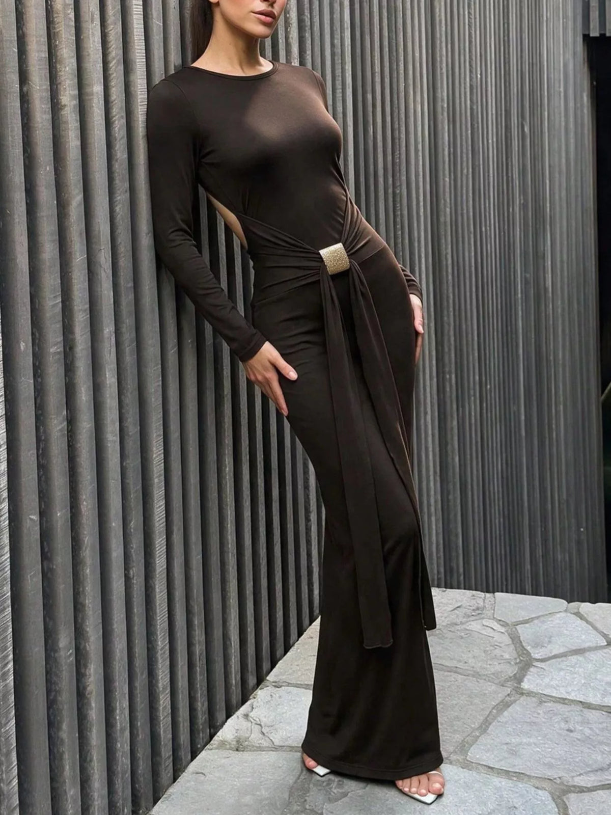 Dark brown backless maxi dress with long sleeves and side cutout, draped waist tie