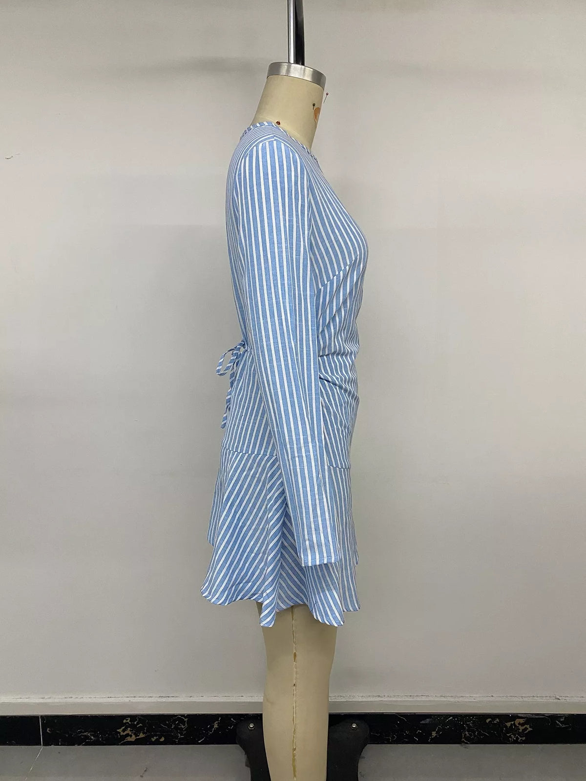 Blue vertical striped long-sleeve mini dress, side-ruching and flared skirt