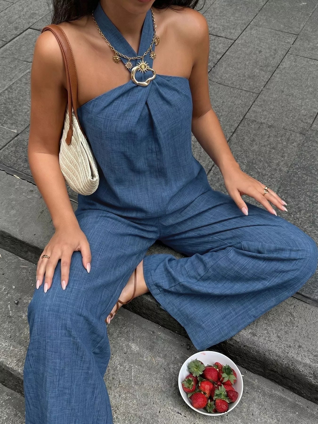 Navy blue halter neck jumpsuit-style set with heart-shaped neckline ring