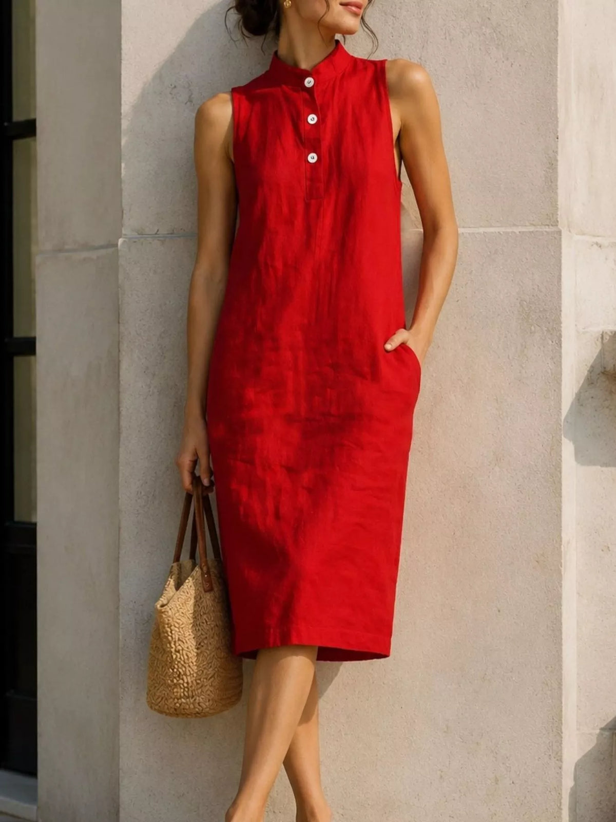 Red sleeveless midi dress with button front and stand collar
