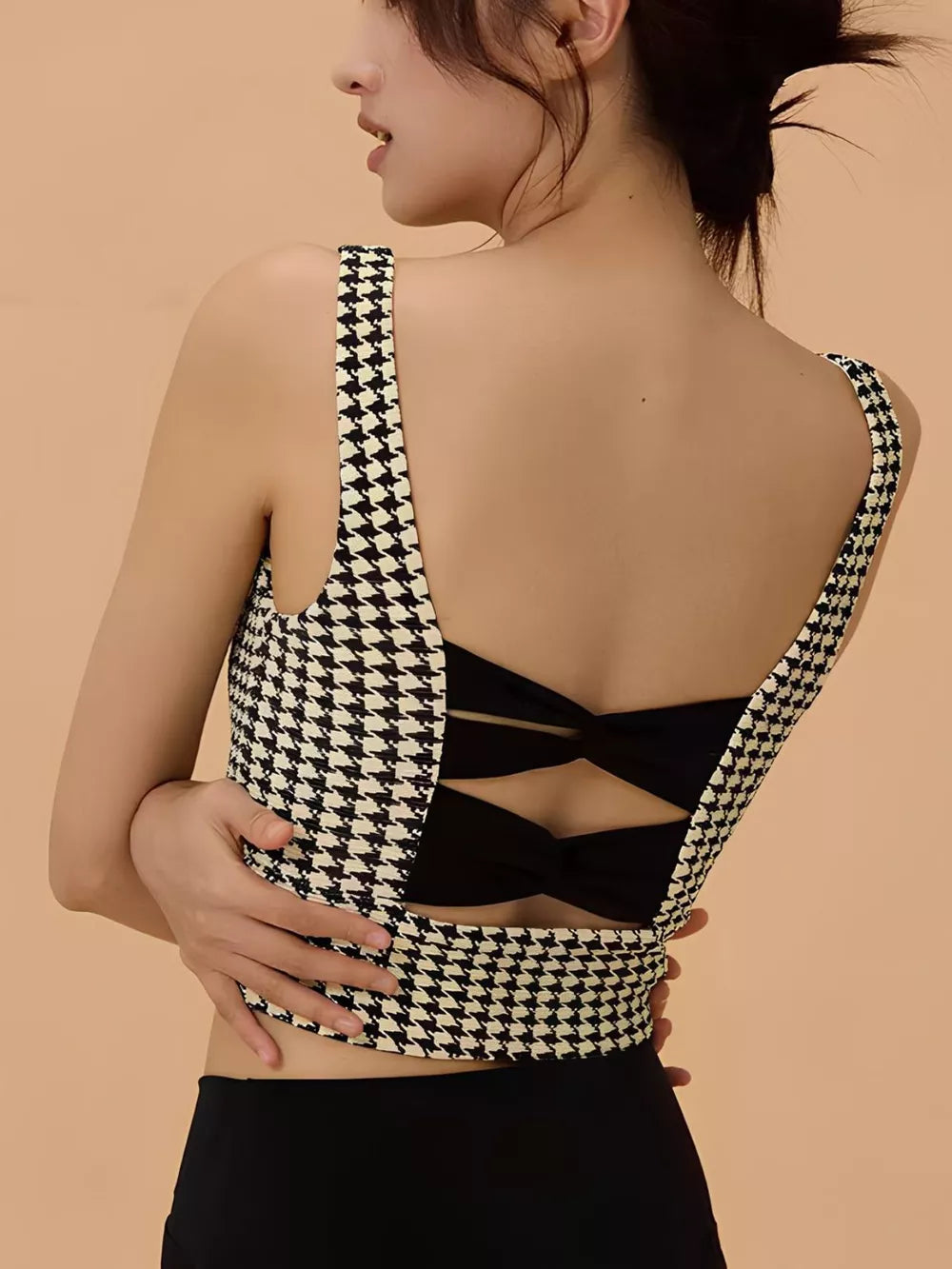 Houndstooth active bra with crisscross open back and black bow detail, black-and-white
