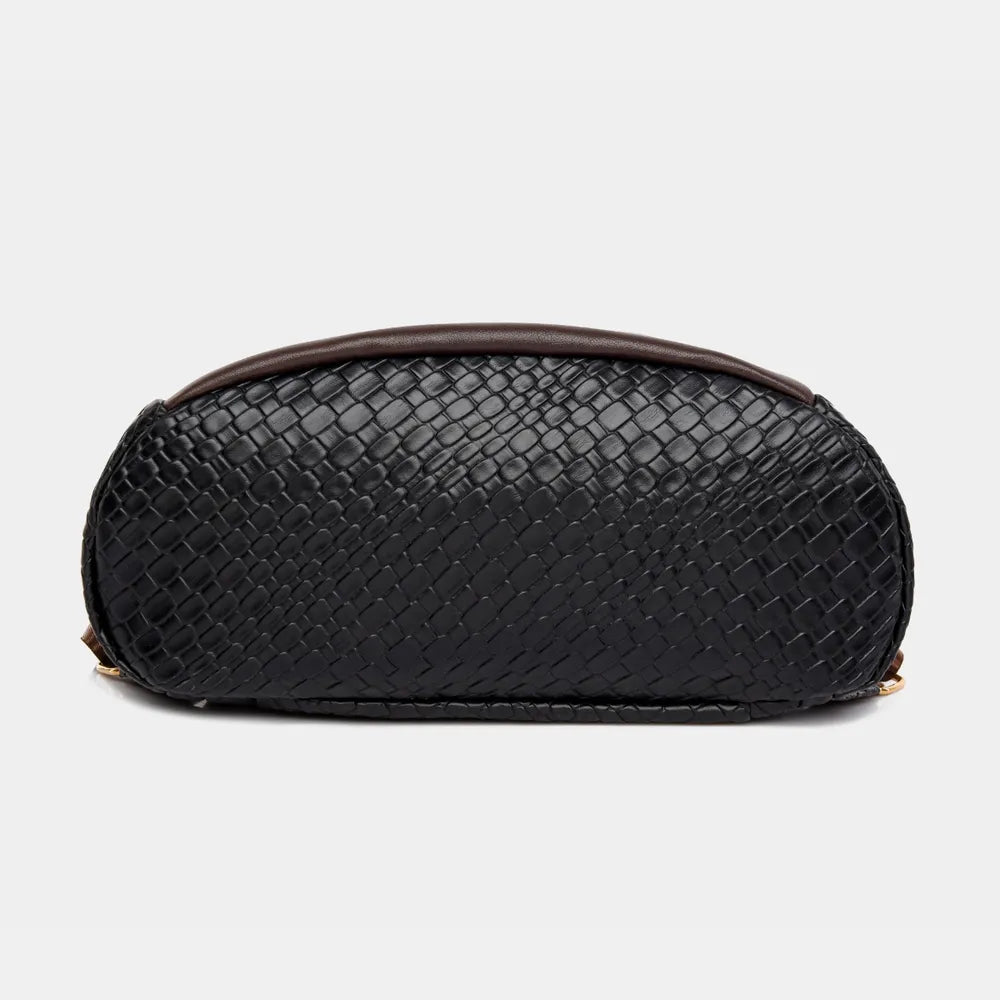 Vegan leather backpack bag in black with rounded top and textured pattern