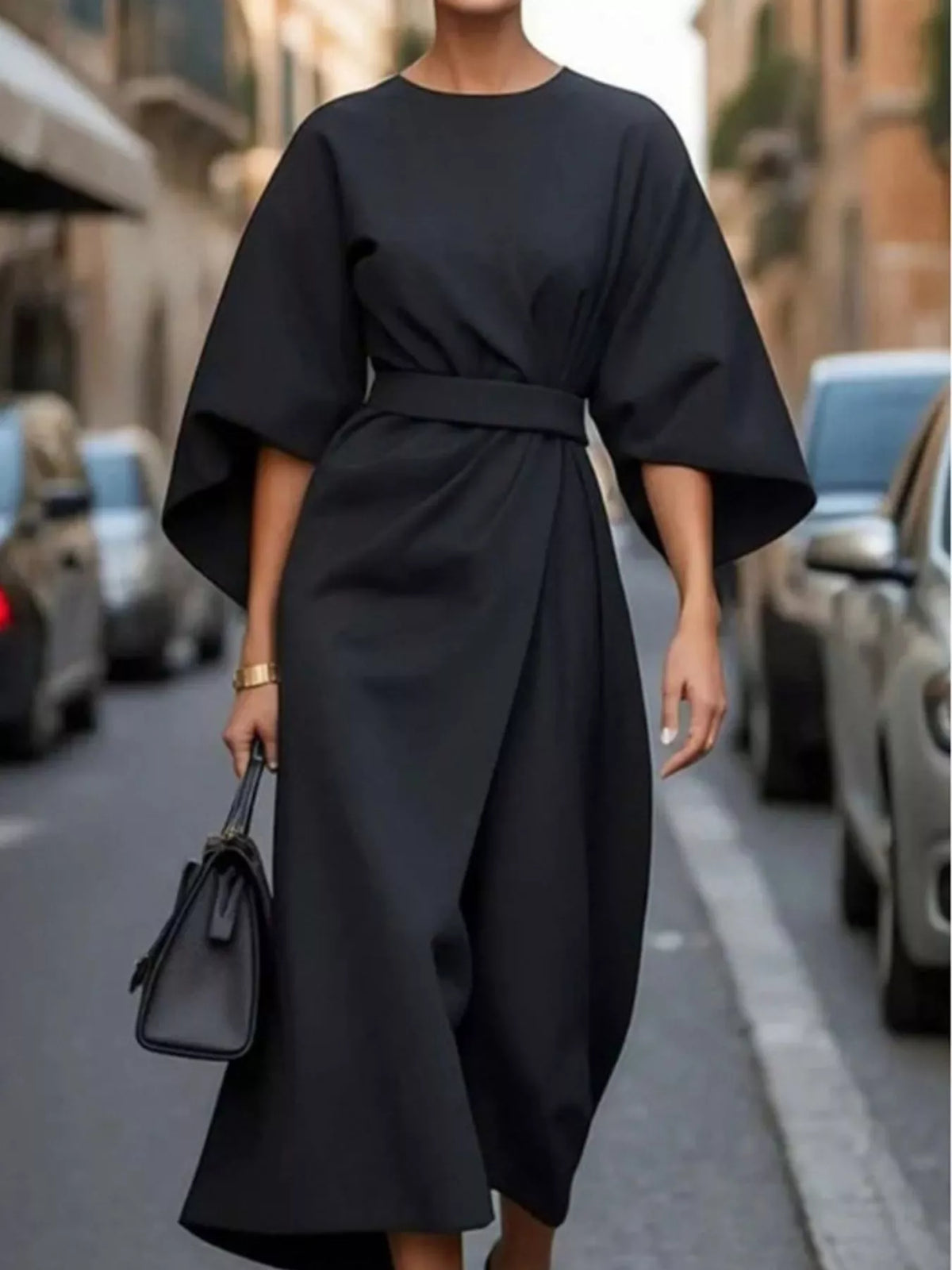 Black kimono-sleeve belted midi dress with high waist and wide draped belt.