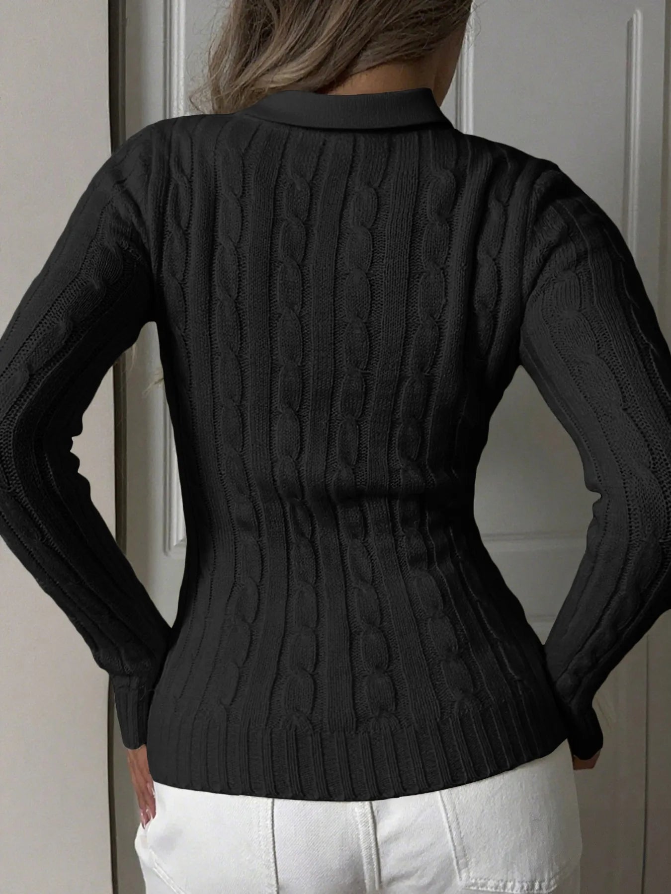 Black cable-knit long-sleeve sweater with textured back cable pattern