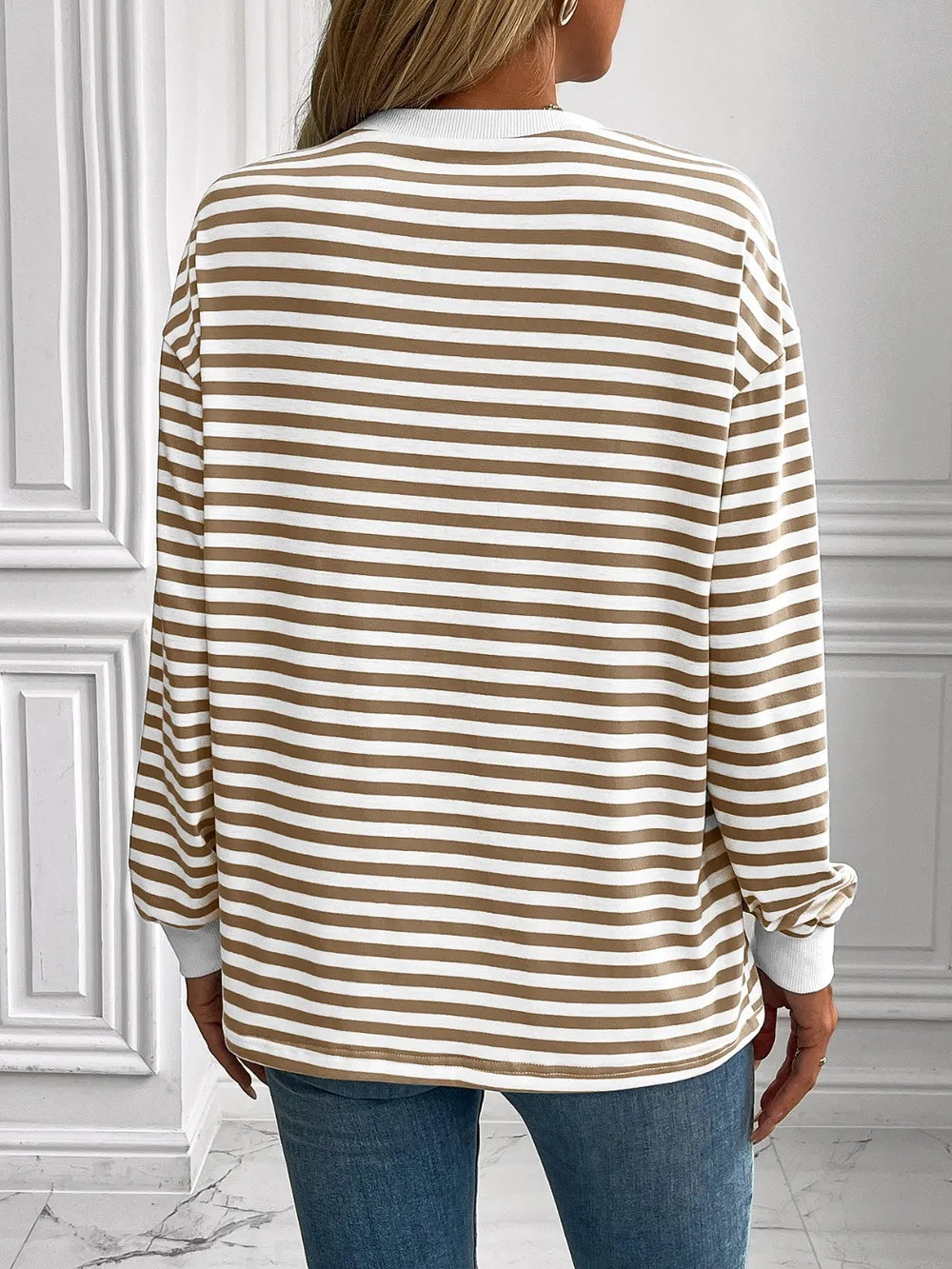 Striped long-sleeve sweatshirt, back view, tan and white horizontal stripes, round neck