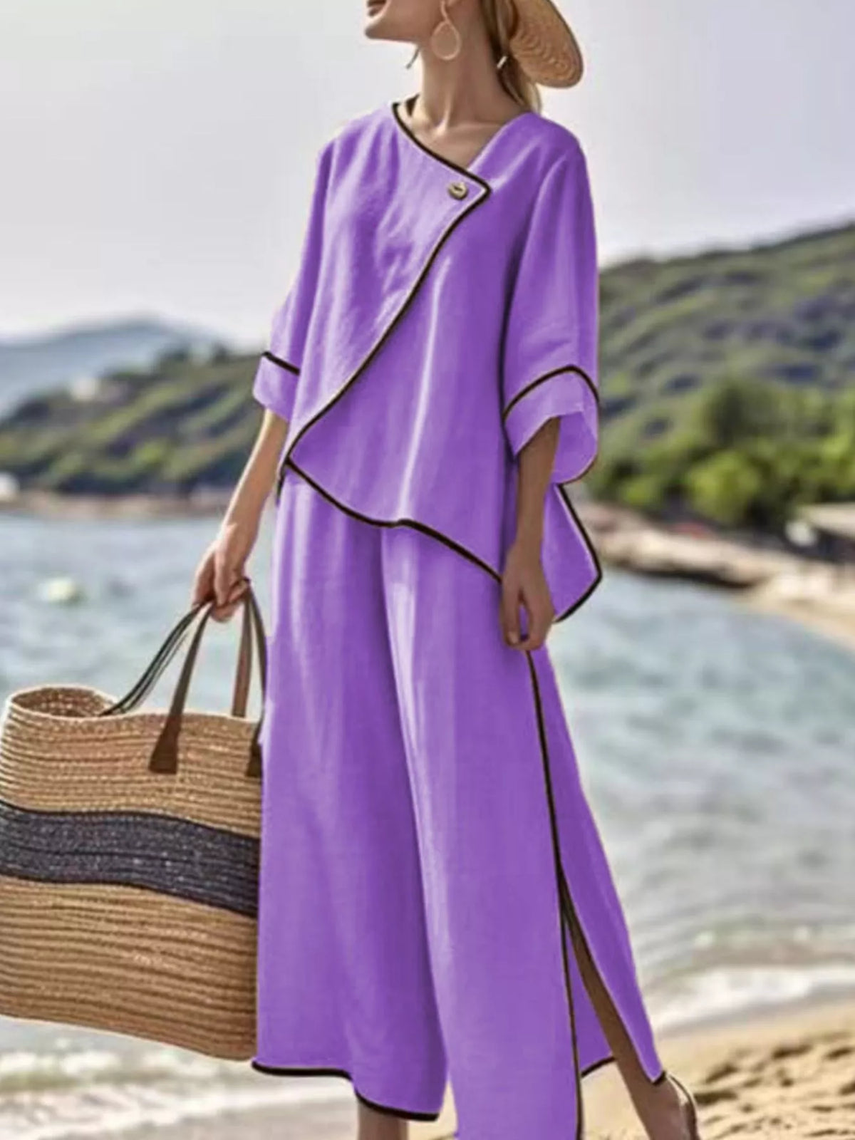 Purple two-piece pants set with contrast trim, buttoned drape top and wide-leg pants
