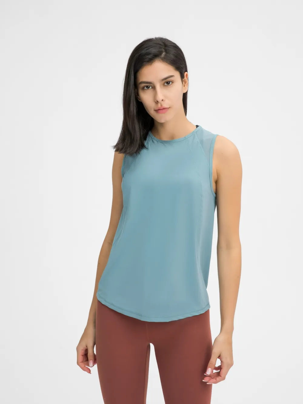 Teal active tank top with round neck and sleeveless silhouette