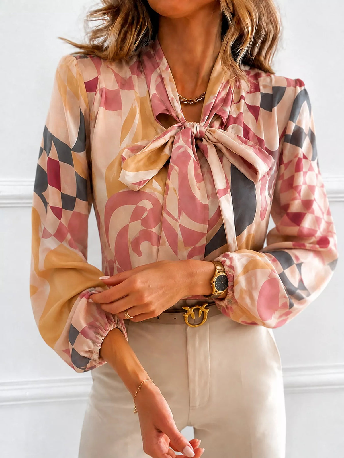 Printed bow-tie neck long-sleeve blouse with abstract check-and-graphic print