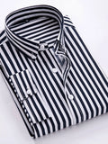 Striped button-up long-sleeve shirt in black and white with white buttons, folded collar