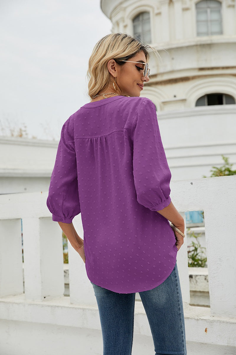 Purple Swiss-dot blouse with gathered yoke and 3/4 puff sleeves, back view