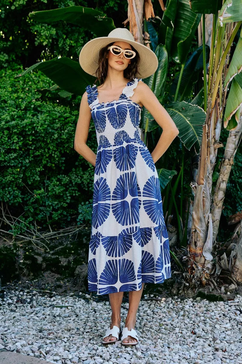 Smocked bodice tiered midi dress with navy abstract print on white, sleeveless front view