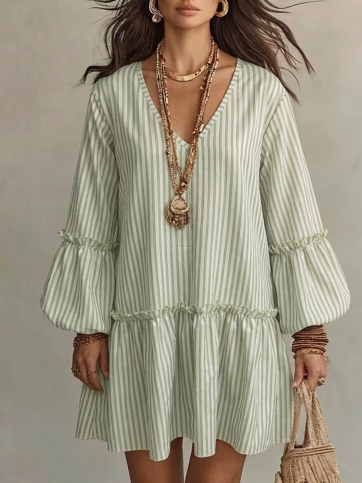 Light green striped V-neck mini dress with balloon sleeves and elastic waist
