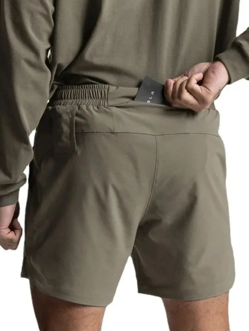 Men's elastic-waist active shorts, dark sage with side pockets and relaxed fit.