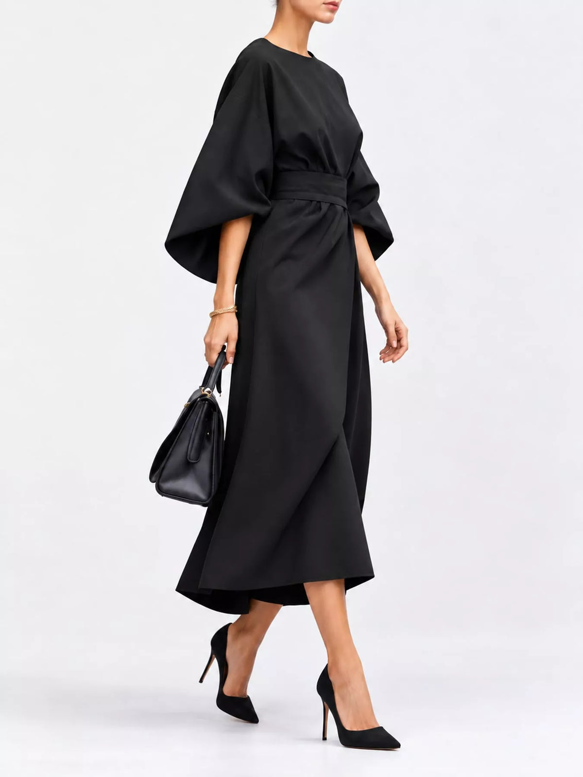 Black kimono-sleeve belted midi dress with high waist and oversized tie belt.