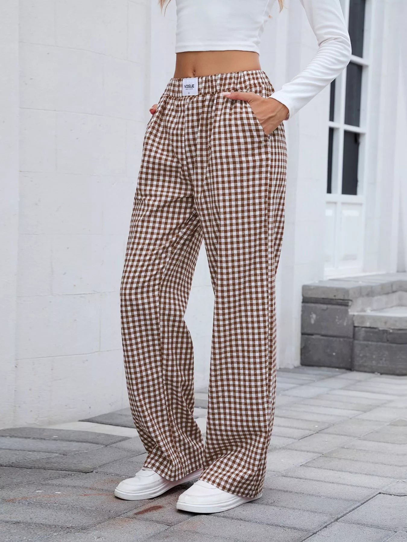 Plaid wide-leg casual pants in brown and cream with elastic waistband, loose fit.