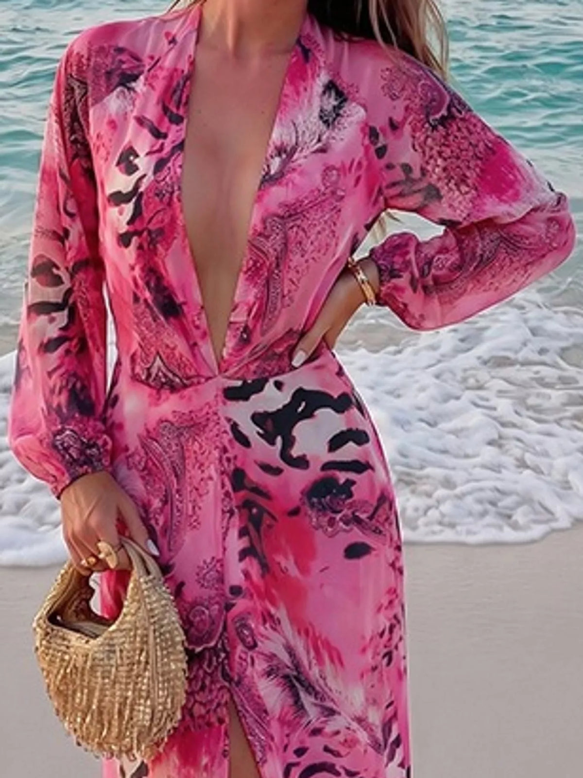 Pink printed maxi dress with deep V-neck and long flowy sleeves