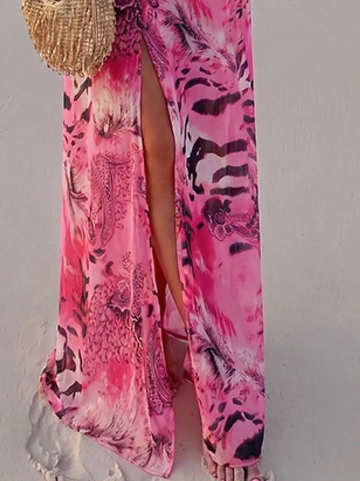 Pink printed maxi dress with deep V-neck and side slit